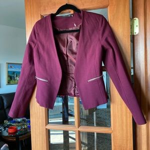 HAVE cropped wine color lined jacket.  Size small